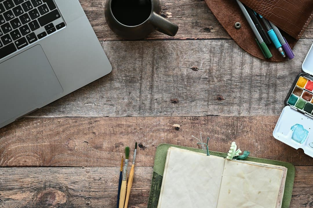 An open notebook and a pen on a desk, ready for the Moly IPTV checklist for comparing IPTV services